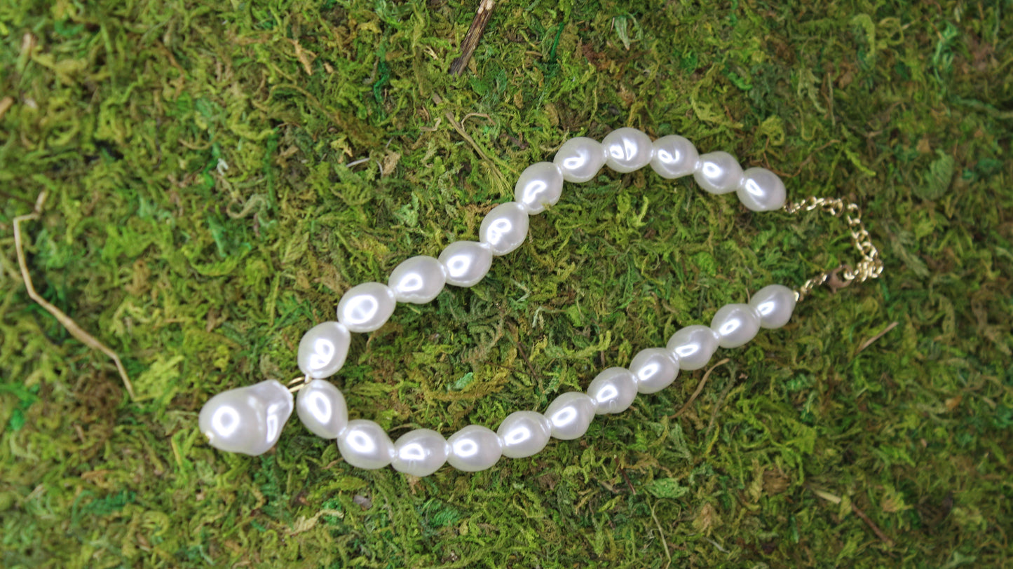 necklace on grass