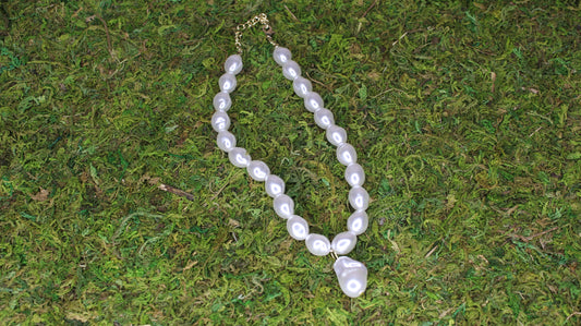necklace on grass